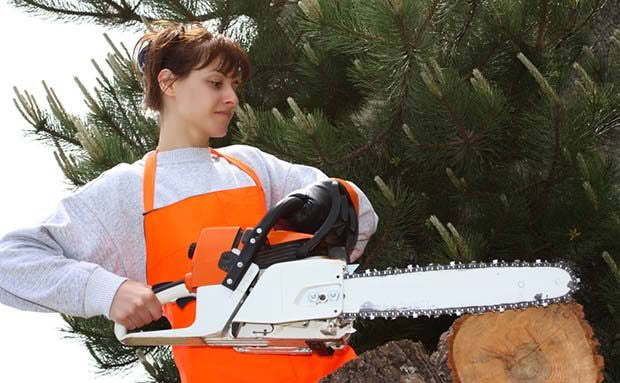 chainsaw and woman