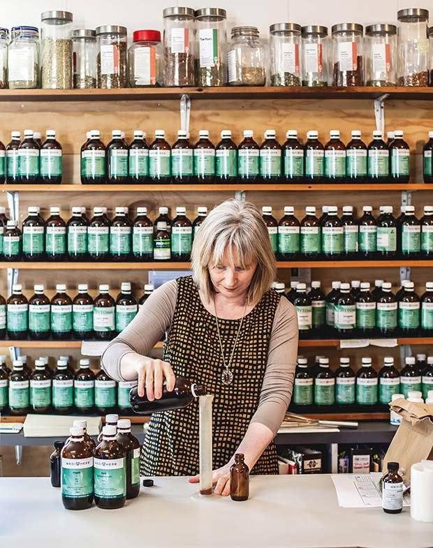 28Bronwyn making up a tincture in the dispensary