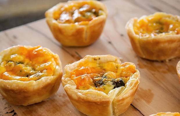 Red leicester cheese and pesto tarts.