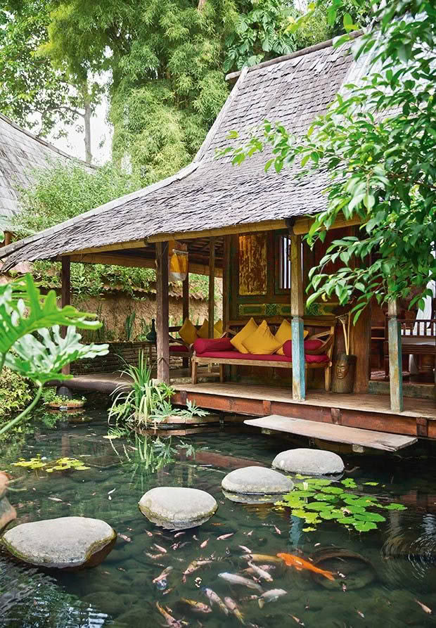 Stepping stones into the resort's Kolam House.