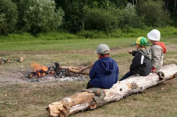 boys at campfire