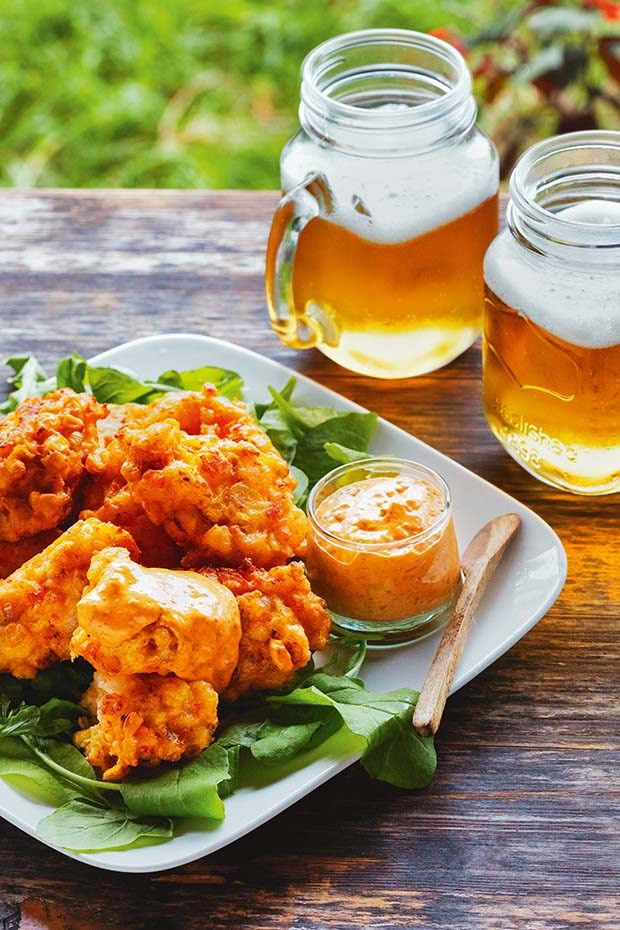 Shrimp & corn fritters with sriracha aioli